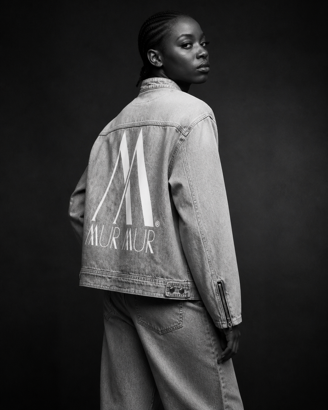 Model wearing the Mur Mur washed denim jacket in a monochrome studio